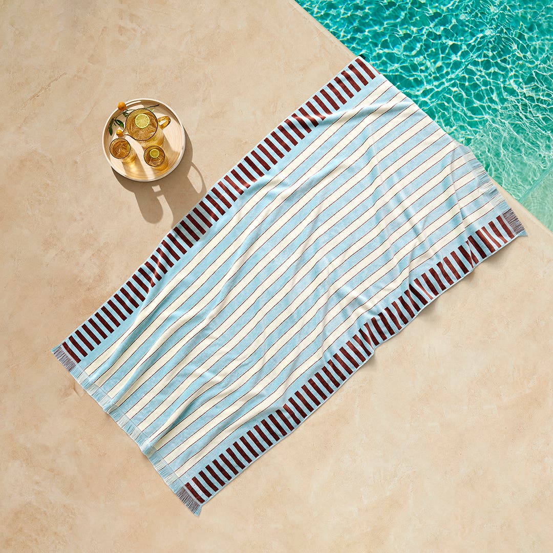 https://s3-ap-southeast-2.amazonaws.com/fusionfactory.commerceconnect.bbnt.production/pim_media/000/217/693/CH_S26-27_Giles-Beach_Towel-Blue-Fig_Powder-Blue_27275101_V2_SI.jpg?1784263127