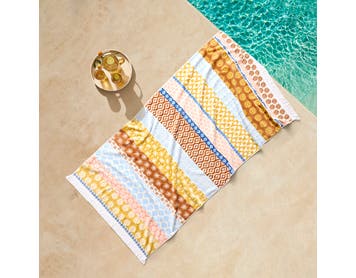 https://s3-ap-southeast-2.amazonaws.com/fusionfactory.commerceconnect.bbnt.production/pim_media/000/217/726/CH_S26-27_Teya-Beach_Towel-Mustard-Blue_Light-Orange_27275401_V2_SI.jpg?1784269563