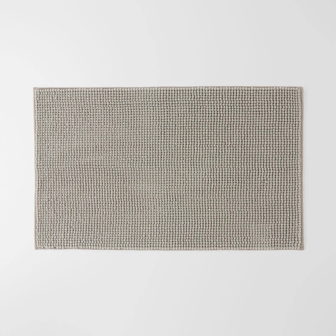 https://s3-ap-southeast-2.amazonaws.com/fusionfactory.commerceconnect.bbnt.production/pim_media/000/155/681/M_F_Bobble-Bath-Mat_Stone_18480302_SI.jpg?1698893916