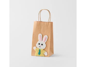 https://s3-ap-southeast-2.amazonaws.com/fusionfactory.commerceconnect.bbnt.production/pim_media/000/204/281/M_F_Easter26_Paper-Bag-w-Boy-Bunny_Yellow_26640601_SI.jpg?1762925252