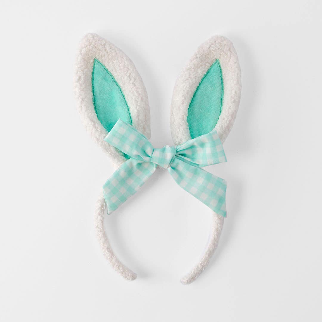 https://s3-ap-southeast-2.amazonaws.com/fusionfactory.commerceconnect.bbnt.production/pim_media/000/204/592/M_F_Easter26_T1-Boucle-Gingham-Headband_Teal_26595001_SI.jpg?1763946555