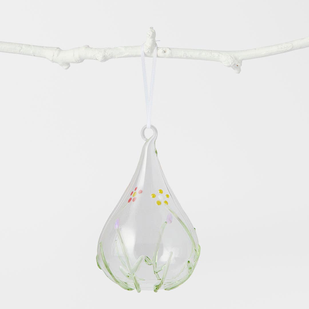 https://s3-ap-southeast-2.amazonaws.com/fusionfactory.commerceconnect.bbnt.production/pim_media/000/204/688/M_F_Easter26_T1-Handpaint-Glass-Teardrop-Ball-w-Foliage_Clear_26624801_SI.jpg?1763959327