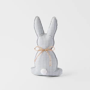 https://s3-ap-southeast-2.amazonaws.com/fusionfactory.commerceconnect.bbnt.production/pim_media/000/204/943/M_F_Easter26_T2-Gingham-Fabric-Weighted-Bunny_Sage-White_26638101_SI.jpg?1764134051