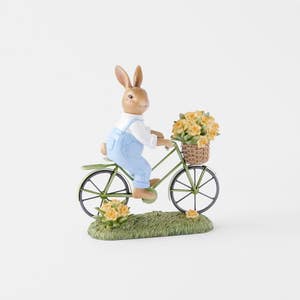 https://s3-ap-southeast-2.amazonaws.com/fusionfactory.commerceconnect.bbnt.production/pim_media/000/204/977/M_F_Easter26_T2-Polyresin-Bunny-on-Bike_Blue-Green_26620201_SI.jpg?1764136082