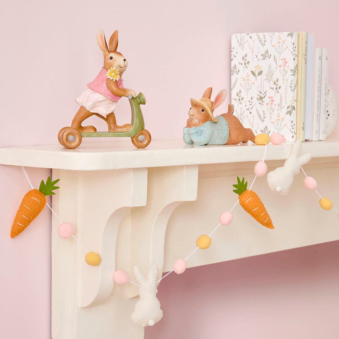 https://s3-ap-southeast-2.amazonaws.com/fusionfactory.commerceconnect.bbnt.production/pim_media/000/186/222/M_F_Easter_E25_LS_Studio_Bunny-Bliss_Standing-Decs_Set_Pink-Carrot-Bunting-Cute-Bunny-Laying-Tummy-Bunny-Riding-Scooter_LS_SI.jpg?1735877736