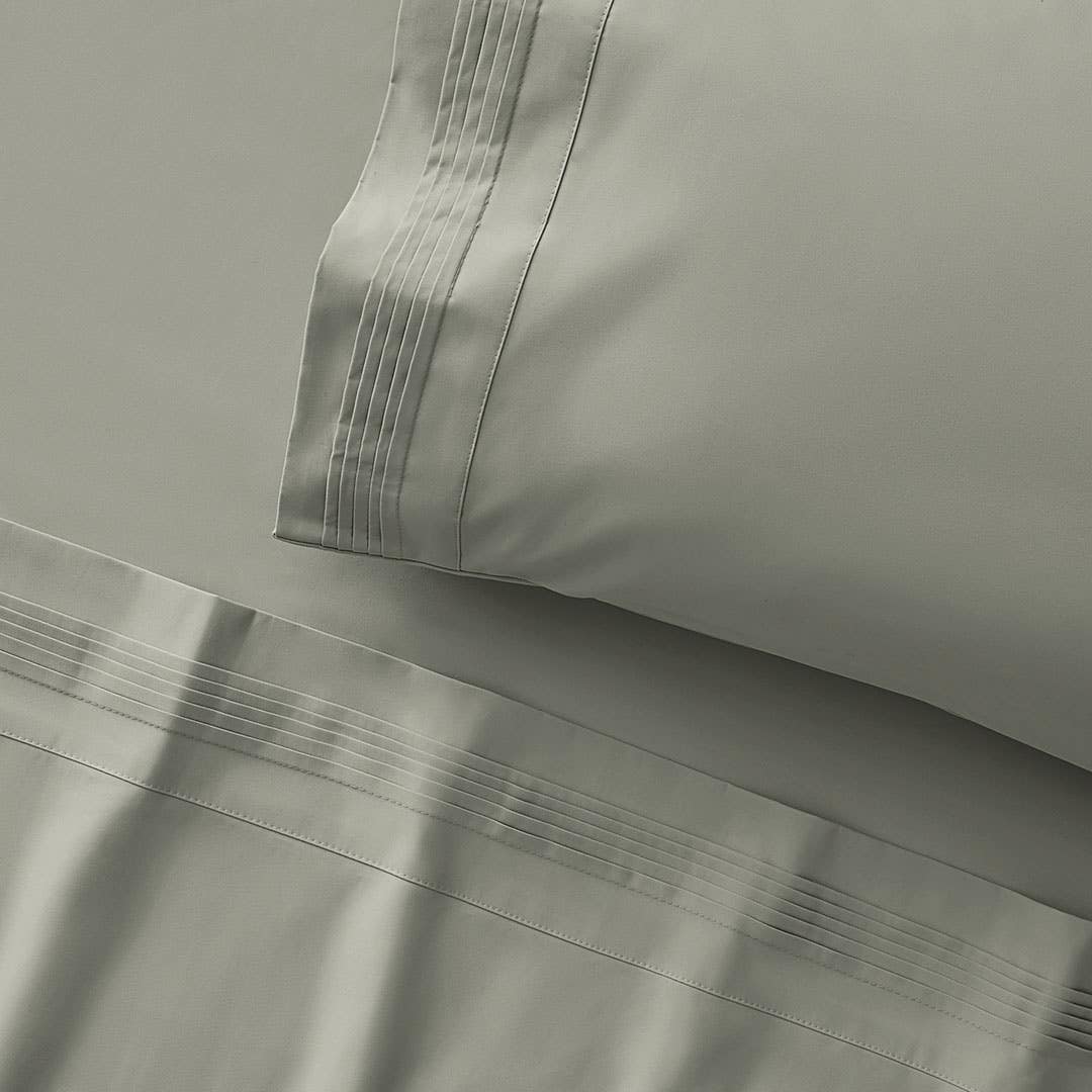 https://s3-ap-southeast-2.amazonaws.com/fusionfactory.commerceconnect.bbnt.production/pim_media/000/157/475/M_F_S23_Sleeping_Beauty_1200TC_Eucalyptus-Green_SS_Detail_SI.jpg?1702957595