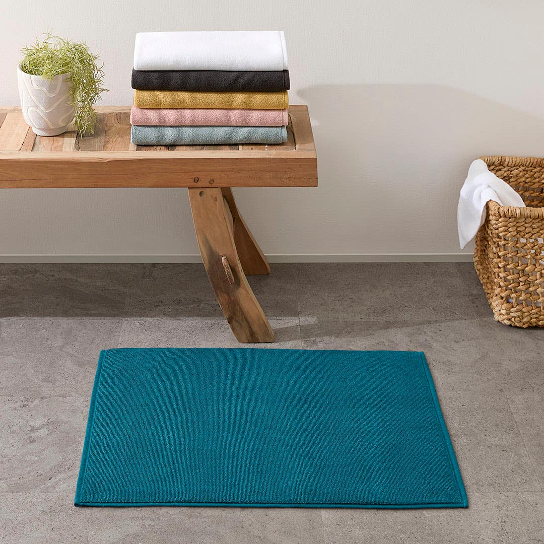 Teal bath mats and towels on sale