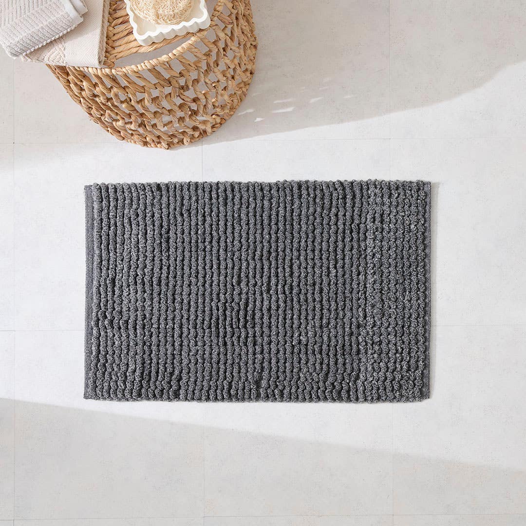 https://s3-ap-southeast-2.amazonaws.com/fusionfactory.commerceconnect.bbnt.production/pim_media/000/174/383/M_F_S24-25_Summer_LS_Studio_Bathmats_Jonah_BM_Charcoal_SI.jpg?1730095748