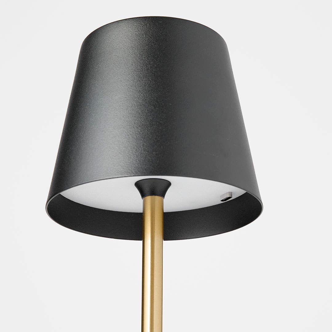 https://s3-ap-southeast-2.amazonaws.com/fusionfactory.commerceconnect.bbnt.production/pim_media/000/201/258/M_F_S25-26_Remona-LED-Table-Lamp_Black-Gold_23413806_Detail-02_SI.jpg?1758072262