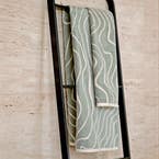 https://s3-ap-southeast-2.amazonaws.com/fusionfactory.commerceconnect.bbnt.production/pim_media/000/173/956/M_F_Summer_S24-25_LS_Location_Bathroom_Bath_Towel_BT_Franco_Soft_Green_1.jpg?1729733406