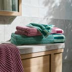 https://s3-ap-southeast-2.amazonaws.com/fusionfactory.commerceconnect.bbnt.production/pim_media/000/203/232/M_F_Summer_S25-26_LS_Bathroom_Towels_Kaito_Set_V7_SI.jpg?1761011132
