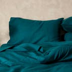 https://s3-ap-southeast-2.amazonaws.com/fusionfactory.commerceconnect.bbnt.production/pim_media/000/194/057/M_F_W25_BOP_Milano_Lake_QQC_Pillow_SI.jpg?1745301804