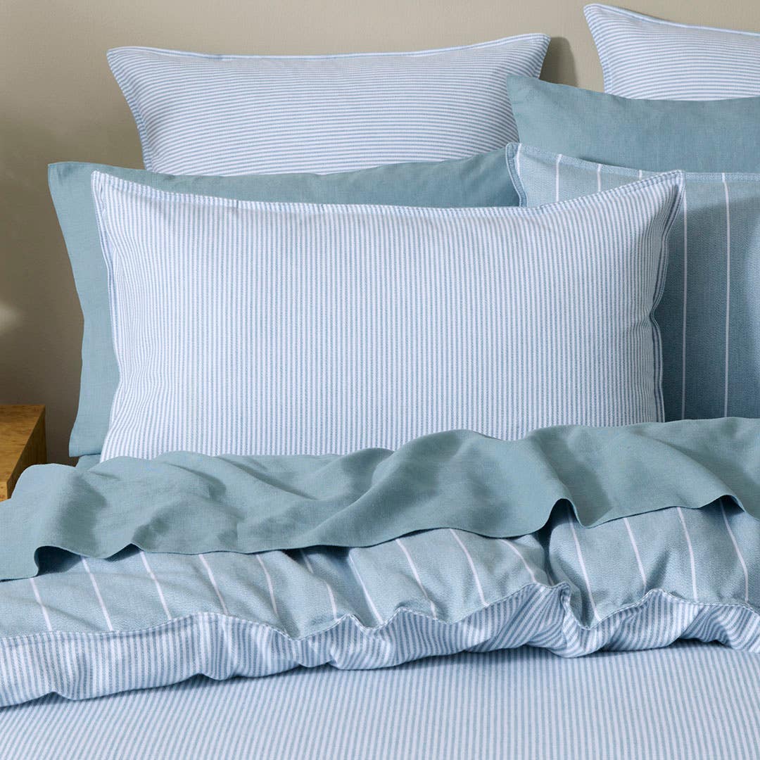 https://s3-ap-southeast-2.amazonaws.com/fusionfactory.commerceconnect.bbnt.production/pim_media/000/205/524/M_F_W26_Bedlinen_BOP_Lex-Smoke_Blue_RV_QQC_Pillow_V2_SI.jpg?1765330108