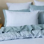 https://s3-ap-southeast-2.amazonaws.com/fusionfactory.commerceconnect.bbnt.production/pim_media/000/205/524/M_F_W26_Bedlinen_BOP_Lex-Smoke_Blue_RV_QQC_Pillow_V2_SI.jpg?1765330108