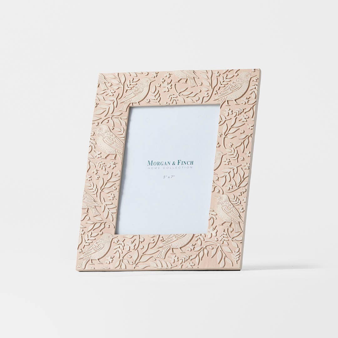 https://s3-ap-southeast-2.amazonaws.com/fusionfactory.commerceconnect.bbnt.production/pim_media/000/205/590/M_F_W26_Birdie-Photo-Frame-5x7_Blush-Pink_26892701_SI.jpg?1765338696
