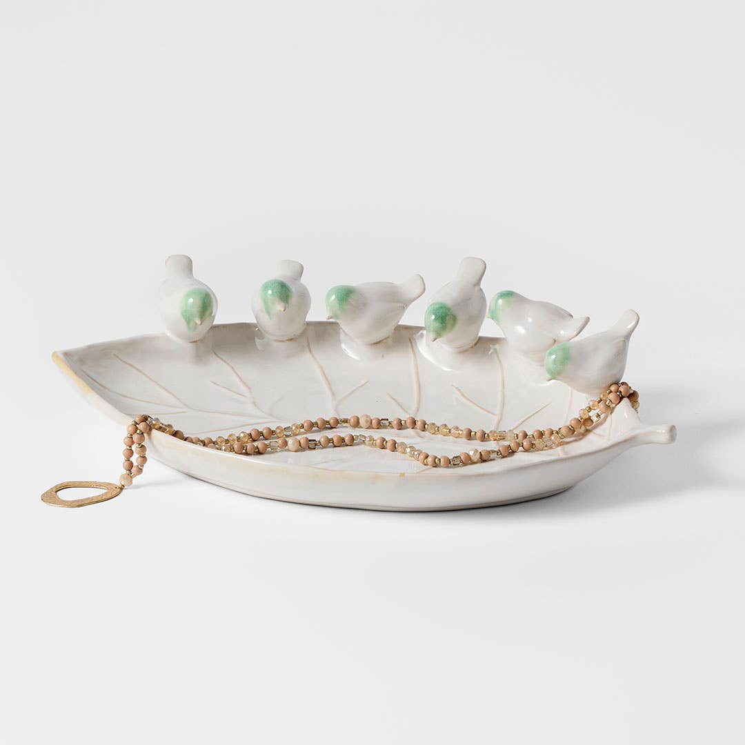 https://s3-ap-southeast-2.amazonaws.com/fusionfactory.commerceconnect.bbnt.production/pim_media/000/205/599/M_F_W26_Birdsong-Ceramic-Plate_White-Green_26911501_SCALE_SI.jpg?1765339537