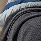 https://s3-ap-southeast-2.amazonaws.com/fusionfactory.commerceconnect.bbnt.production/pim_media/000/206/979/M_F_W26_Blanket_BOP_Lennie_Granite-Detail-2_SI.jpg?1767930515