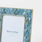 https://s3-ap-southeast-2.amazonaws.com/fusionfactory.commerceconnect.bbnt.production/pim_media/000/205/706/M_F_W26_Coventry-Photo-Frame-5x7_Blue_26892501_Detail_SI.jpg?1765343026