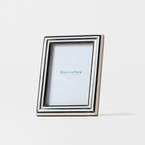 https://s3-ap-southeast-2.amazonaws.com/fusionfactory.commerceconnect.bbnt.production/pim_media/000/210/038/M_F_W26_Horgan-Resin-Frame-5x7_Navy-White_26906201_SI.jpg?1771221156