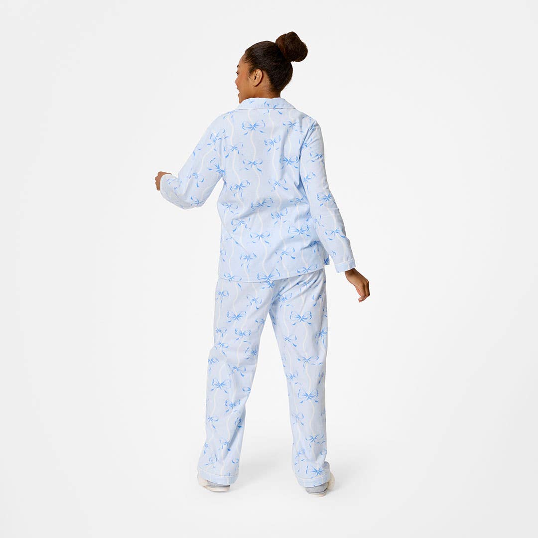 https://s3-ap-southeast-2.amazonaws.com/fusionfactory.commerceconnect.bbnt.production/pim_media/000/208/436/M_F_W26_Pretty-Bows-Flannel-PJs_LRG_Blue_26841402_V2_SI.jpg?1770615006