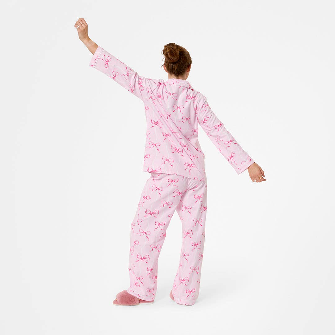 https://s3-ap-southeast-2.amazonaws.com/fusionfactory.commerceconnect.bbnt.production/pim_media/000/208/469/M_F_W26_Pretty-Bows-Flannel-PJs_SML_Pink_26841401_V2_SI.jpg?1770616073