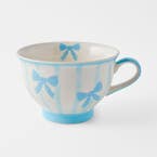 https://s3-ap-southeast-2.amazonaws.com/fusionfactory.commerceconnect.bbnt.production/pim_media/000/207/030/M_F_W26_Sandy-Bows-Pedestal-Tea-Cup_Blue_26917601_SI.jpg?1767932160