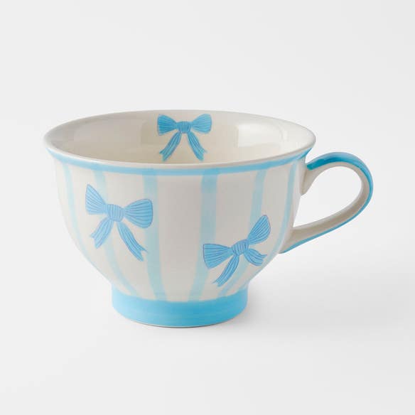 https://s3-ap-southeast-2.amazonaws.com/fusionfactory.commerceconnect.bbnt.production/pim_media/000/207/030/M_F_W26_Sandy-Bows-Pedestal-Tea-Cup_Blue_26917601_SI.jpg?1767932160