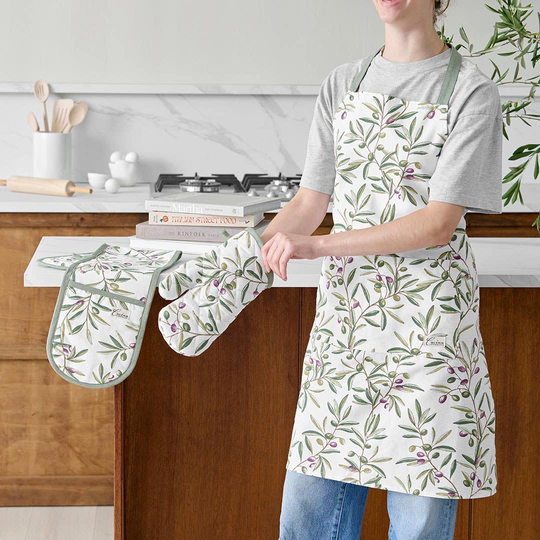 https://s3-ap-southeast-2.amazonaws.com/fusionfactory.commerceconnect.bbnt.production/pim_media/000/210/605/M_F_W26_Studio_LS_Napery_Olive_Grove_Apron_Glove_SI.jpg?1772586039