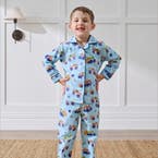 https://s3-ap-southeast-2.amazonaws.com/fusionfactory.commerceconnect.bbnt.production/pim_media/000/207/551/M_F_Winter_26_Studio_Kids_PJs-Flannel_Derby-Time-2_SI.jpg?1769488324