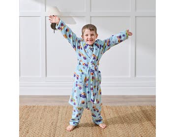 https://s3-ap-southeast-2.amazonaws.com/fusionfactory.commerceconnect.bbnt.production/pim_media/000/207/559/M_F_Winter_26_Studio_Kids_PJs-Flannel_Derby-Time-Plush_Robe-2_SI.jpg?1769489275