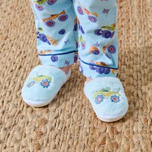 https://s3-ap-southeast-2.amazonaws.com/fusionfactory.commerceconnect.bbnt.production/pim_media/000/207/566/M_F_Winter_26_Studio_Kids_PJs-Flannel_Derby-Time-Plush_Slippers_SI.jpg?1769489889