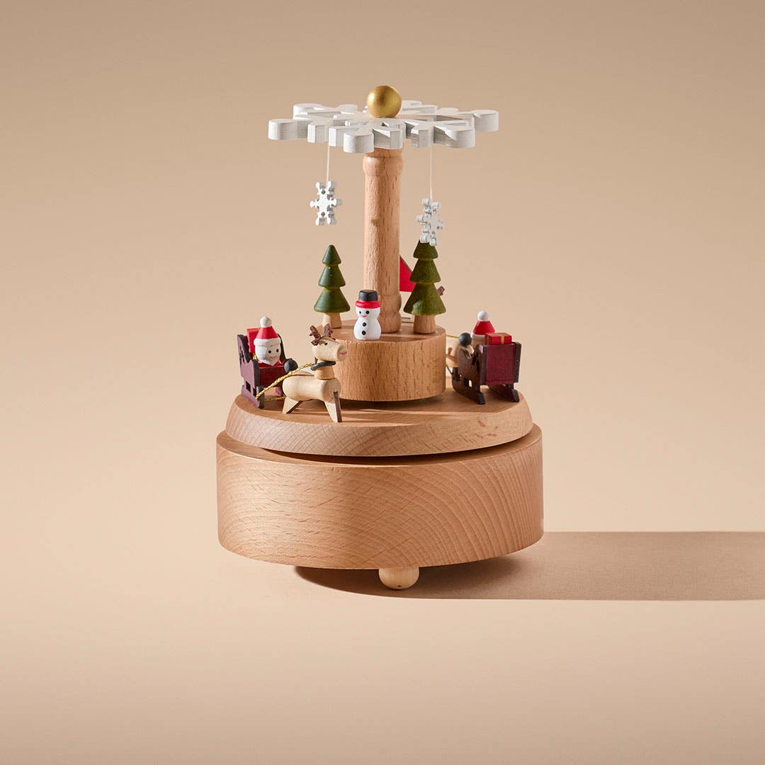 https://s3-ap-southeast-2.amazonaws.com/fusionfactory.commerceconnect.bbnt.production/pim_media/000/214/900/M_F_Xmas-26-27_CG_TOY_Wooden-Sledding-Santca-Musical-Box-Natural_20579701_SI.jpg?1781662788