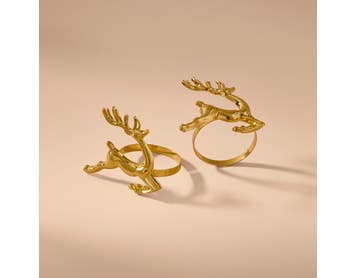 https://s3-ap-southeast-2.amazonaws.com/fusionfactory.commerceconnect.bbnt.production/pim_media/000/212/997/M_F_Xmas-26-27_CG_XMAS_DINING_S4_Reindeer_Napkin_Rings_27038301_SI.jpg?1777616058