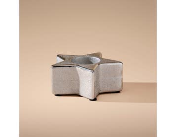 https://s3-ap-southeast-2.amazonaws.com/fusionfactory.commerceconnect.bbnt.production/pim_media/000/215/055/M_F_Xmas-26-27_LM_CANDLEHOL_Textured-Star-Tlight-Candleholder_27002001_SI.jpg?1781738609