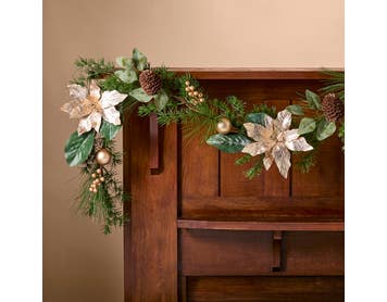 https://s3-ap-southeast-2.amazonaws.com/fusionfactory.commerceconnect.bbnt.production/pim_media/000/213/499/M_F_Xmas-26-27_LM_GARLAND_1.8m-Gold-Poinsettia-Pine-Garland_26281201_SI.jpg?1779078494