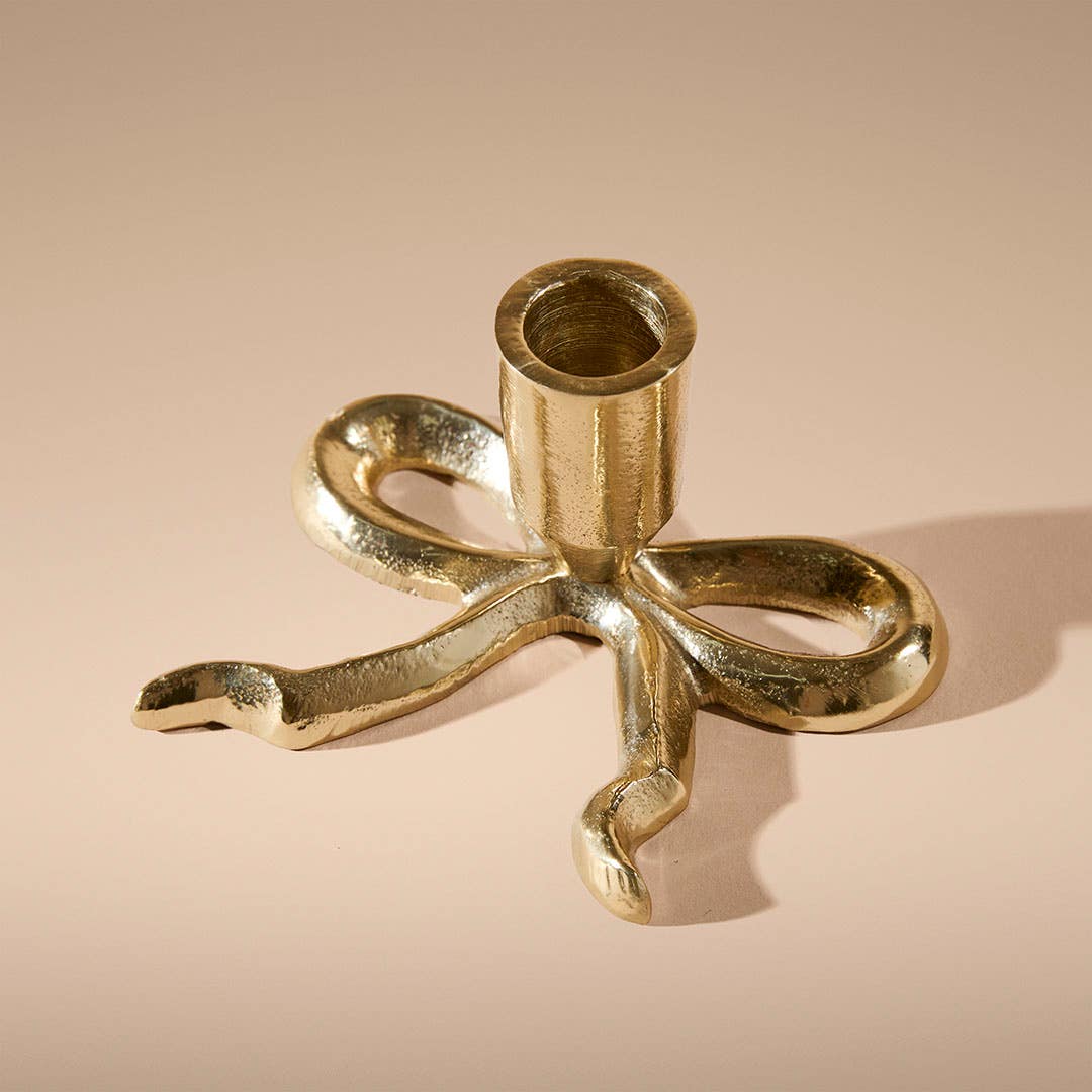 https://s3-ap-southeast-2.amazonaws.com/fusionfactory.commerceconnect.bbnt.production/pim_media/000/214/671/M_F_Xmas-26-27_MR_CANDLEHOL_Flat-Bow-Taper-Candle-Holder_27038601_SI.jpg?1781503455