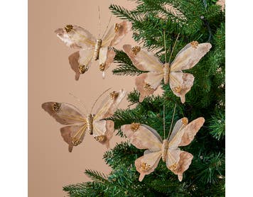 https://s3-ap-southeast-2.amazonaws.com/fusionfactory.commerceconnect.bbnt.production/pim_media/000/214/590/M_F_Xmas-26-27_MR_Decs_Set_S4-Velvet-Butterfly-Clips_27012501_SI.jpg?1781489915