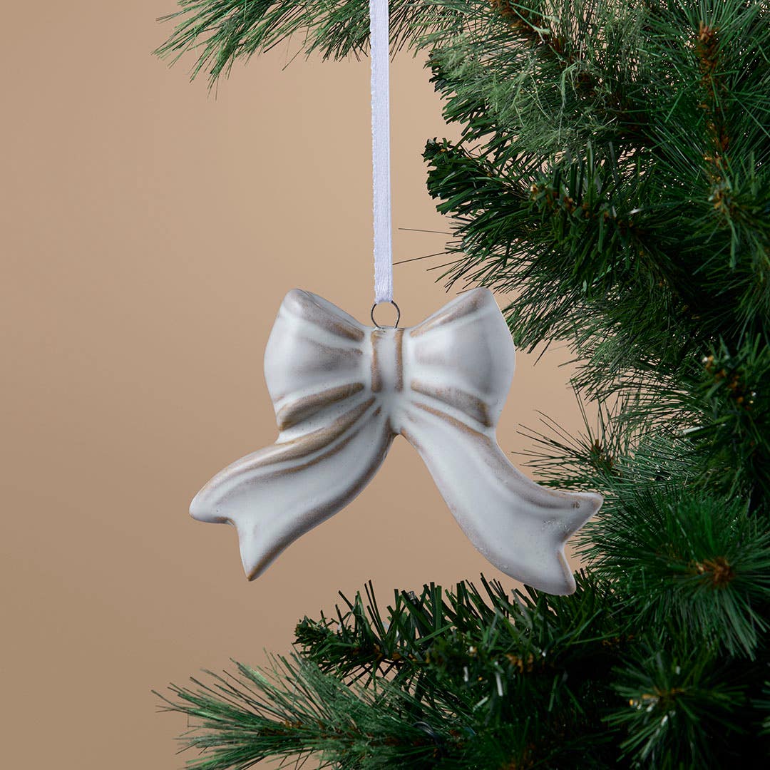 https://s3-ap-southeast-2.amazonaws.com/fusionfactory.commerceconnect.bbnt.production/pim_media/000/216/730/M_F_Xmas-26-27_S4_HT_DECS_Ceramic-Bow-Dec_27063701_SI.jpg?1783636903