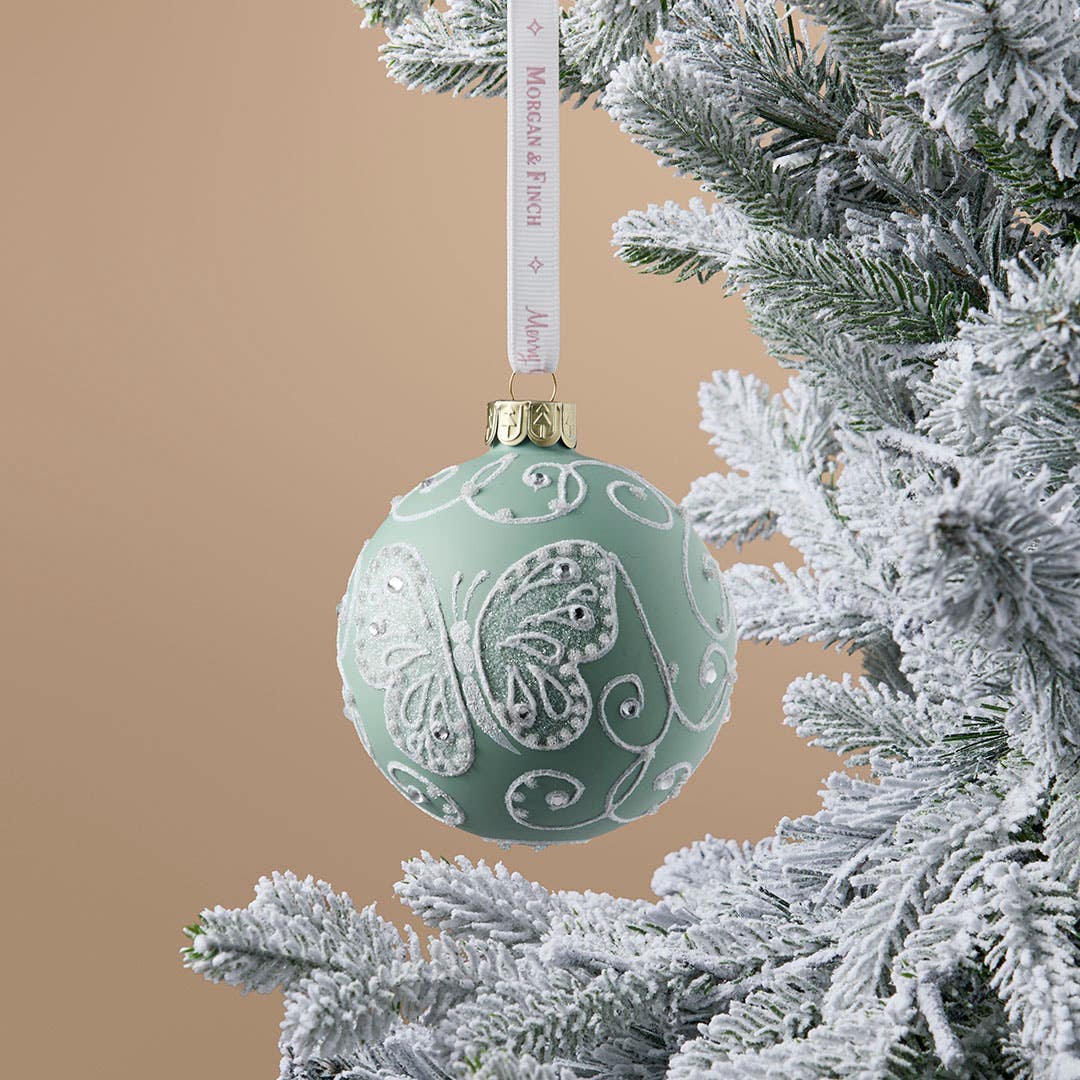 https://s3-ap-southeast-2.amazonaws.com/fusionfactory.commerceconnect.bbnt.production/pim_media/000/216/880/M_F_Xmas-26-27_S4_LM_DECS_Glass-Ball-w-Glitter-Butterfly_27063501_SI.jpg?1783672520