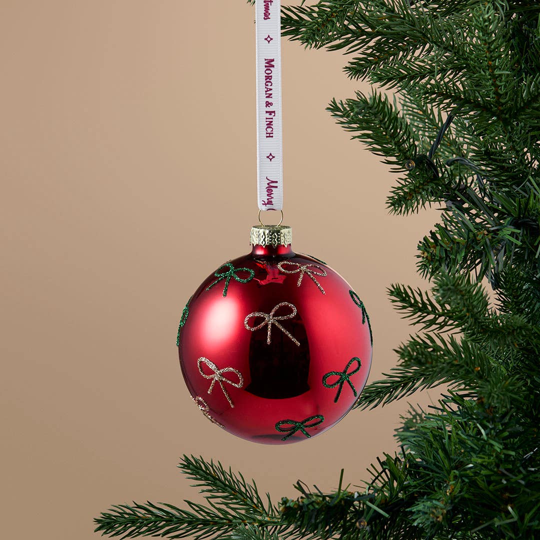 https://s3-ap-southeast-2.amazonaws.com/fusionfactory.commerceconnect.bbnt.production/pim_media/000/217/322/M_F_Xmas-26-27_S4_MR_DECS_Glass-Ball-w-Glitter-Bows_27063201_SI.jpg?1784079316