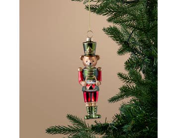 https://s3-ap-southeast-2.amazonaws.com/fusionfactory.commerceconnect.bbnt.production/pim_media/000/217/335/M_F_Xmas-26-27_S4_MR_DECS_Glass-Bear-Nutcracker-Dec_27072401_SI.jpg?1784080228